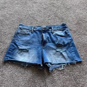 High rise distressed midi shorts